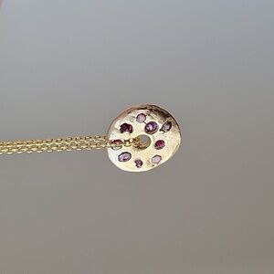 Gold spinner necklace